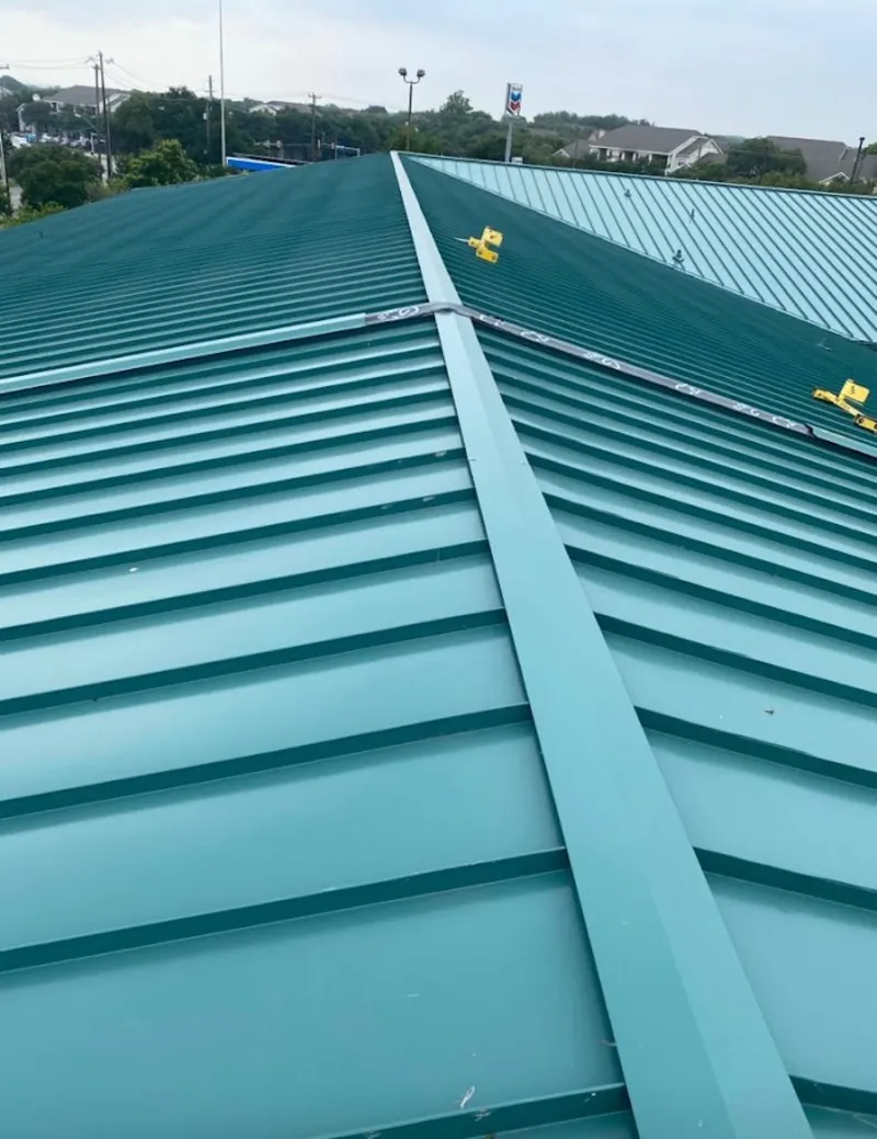 Green commercial metal roof ridge and valley for Metal Roof Repair in Fall River