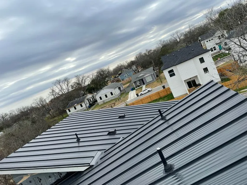 Standing seam metal roof panels with vents for Skylight Repair in Fall River